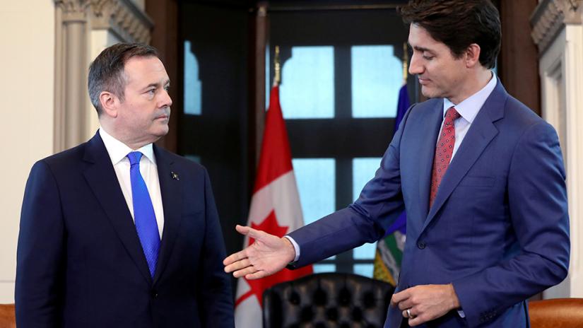 Canada's Prime Minister Justin Trudeau reaches out to shake hands with Alberta Premier Jason Kenney during a meeting in Trudeau's office on Parliament Hill in Ottawa, Ontario, Canada, May 2, 2019. REUTERS/