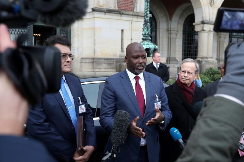 Gambia`s Justice Minister Abubacarr Tambadou talks to the media after a hearing in a case filed by Gambia against Myanmar alleging genocide against the minority Muslim Rohingya population, at the International Court of Justice (ICJ) in The Hague, Netherlands December 10, 2019. REUTERS