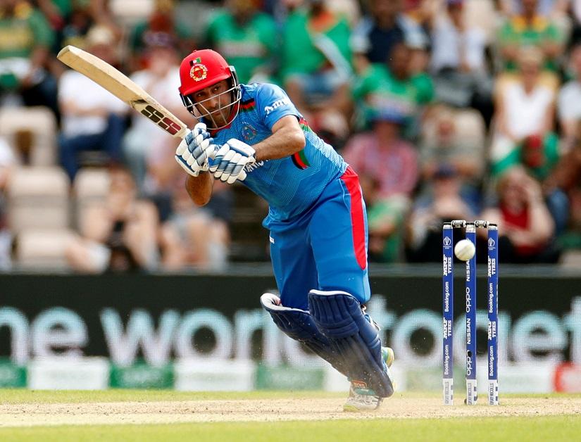 FILE PHOTO: Cricket - ICC Cricket World Cup - Bangladesh v Afghanistan - The Ageas Bowl, Southampton, Britain - June 24, 2019. Afghanistan`s Asghar Afghan in action Action Images via Reuters