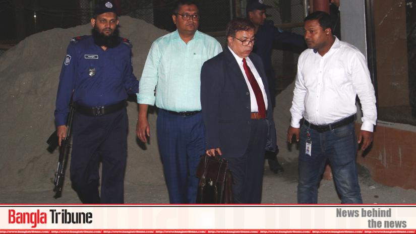 Police are seen escorting former executive engineer of Public Works Department Masudul Alam (second from left) after Anti Corruption Commission arrests 13 people including Alam on graft charges in the housing project for Rooppur Nuclear Power Plant Project (RNPP) on Thursday (Dec 12).