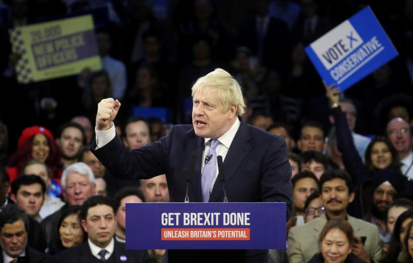 Britain`s Prime Minister Boris Johnson speaks during a final general election campaign event in London, Britain, December 11, 2019. REUTERS
