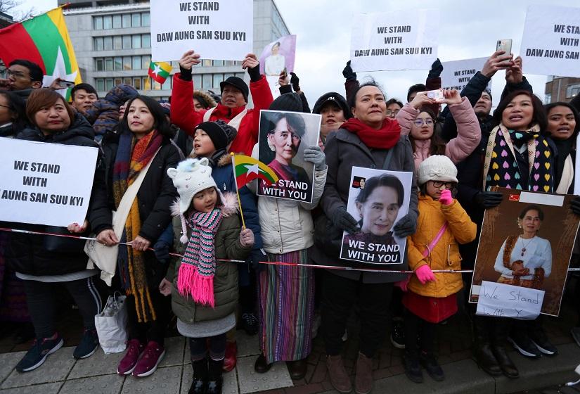 Supporters of Myanmar`s leader Aung San Suu Kyi gather outside the International Court of Justice (ICJ), the top United Nations court, during court hearings in a case filed by Gambia against Myanmar alleging genocide against the minority Muslim Rohingya population, in The Hague, Netherlands Dec 12, 2019. REUTERS
