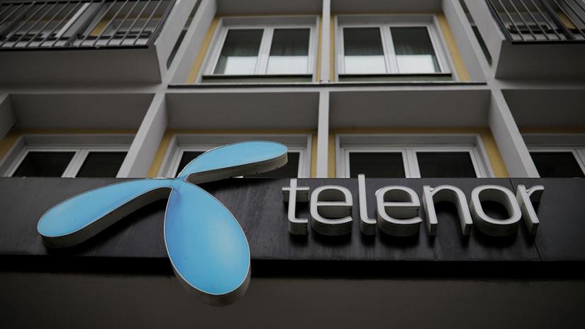 FILE PHOTO: Telenor`s logo is seen in central Belgrade, Serbia, Mar 21, 2018. REUTERS