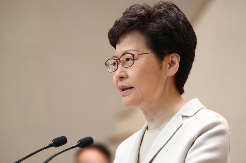 FILE PHOTO: Hong Kong chief executive Carrie Lam speaks to the media in a weekly news briefing after local elections in Hong Kong, China, Nov 26, 2019. REUTERS