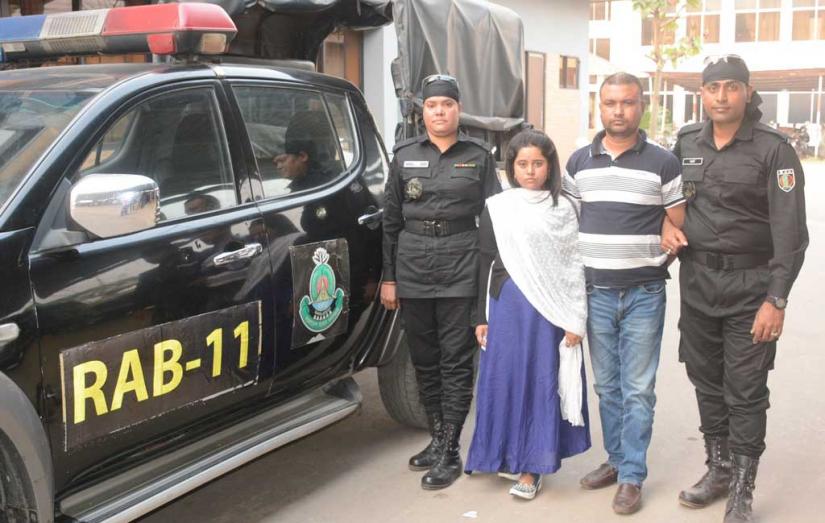 RAB presents a couple before media, arrested with 12,000 yaba pills in Narayanganj on Saturday, Dec 14, 2019