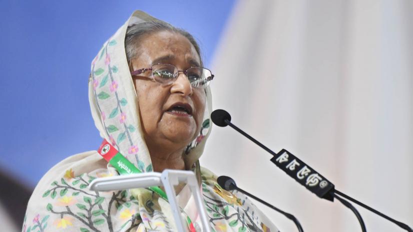 Prime Minister Sheikh Hasina addresses the inauguration of the AL’s 21st National Council at the historic Suhrawardy Udyan in Dhaka on Friday (Dec 20). FOCUS BANGLA