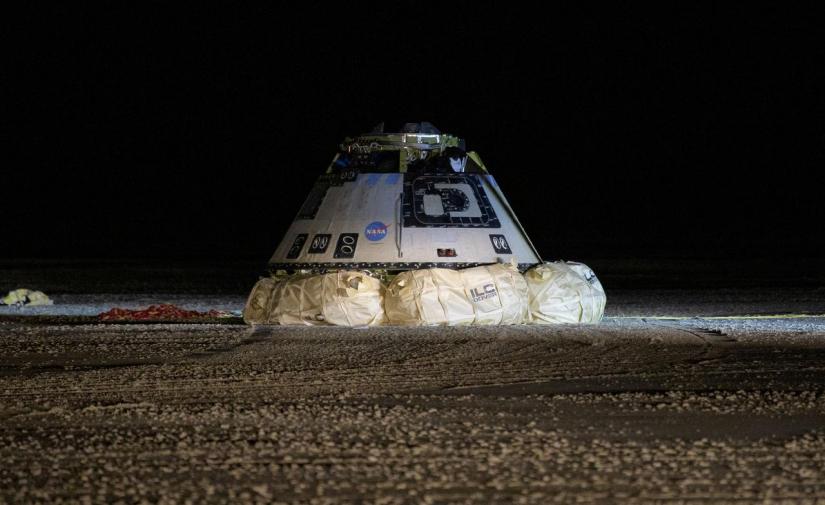 The Boeing CST-100 Starliner spacecraft, which had been launched on a United Launch Alliance Atlas V rocket, is seen after its descent by parachute following an abbreviated Orbital Flight Test for NASA’s Commercial Crew programs in White Sands, New Mexico, US Dec 22, 2019. NASA/Bill Ingalls via REUTERS