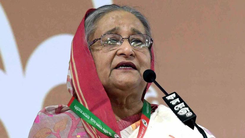 Prime Minister Sheikh Hasina addresses the opening session of Awami League`s 21st National Council at Institution of Engineers, Bangladesh (IEB) on Saturday, December 21, 2019.PID