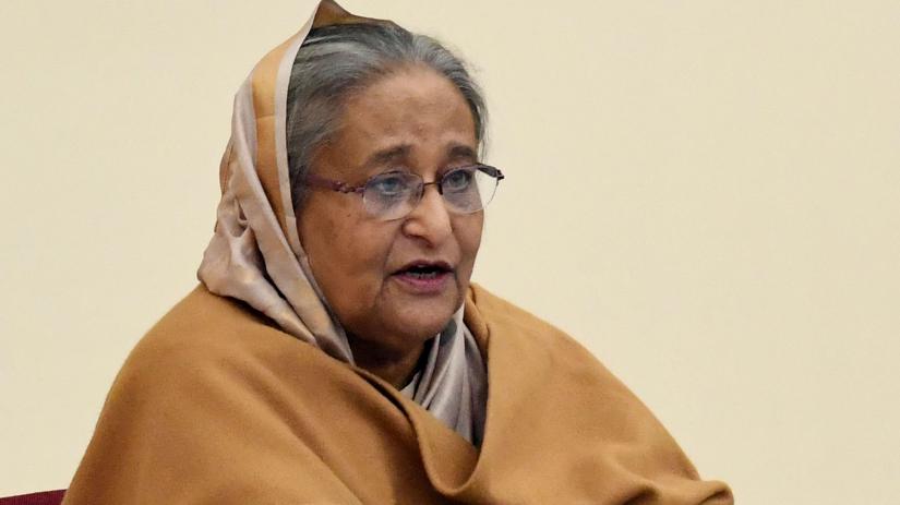 FILE PHOTO: Prime Minister Sheikh Hasina addresses a meeting of Awami League at the Ganabhaban in Dhaka on Dec 22, 2019. PID