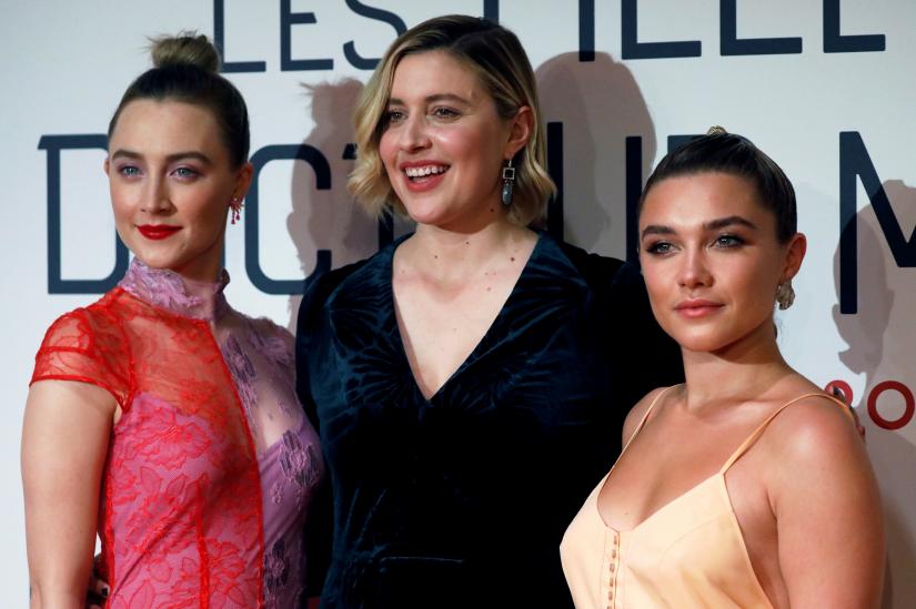 FILE PHOTO: Director Greta Gerwig and cast members Saoirse Ronan and Florence Pugh pose at the premiere of the film `Little Women` in Paris, France, December 12, 2019. REUTERS