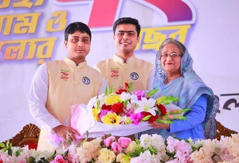 Awami League chief and Prime Minister Sheikh Hasina is seen with Bangladesh Chhatra League President Al Nahiyan Khan Joy and general secretary Lekhok Bhattacharya at the reunion of the the ruling party`s student organisation on marking its 72nd founding anniversary at Suhrawardy Udyan in Dhaka, Saturday (Jan 4). FACEBOOK