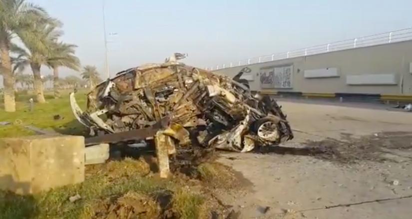 A damaged car, claimed to belong to Qassem Soleimani and Abu Mahdi al Muhandis, is seen near Baghdad International Airport, Iraq January 3, 2020 in this still image taken from video via REUTERS