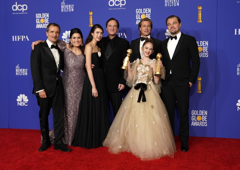 77th Golden Globe Awards - Photo Room - Beverly Hills, California, U.S., January 5, 2020 - The cast of `Once Upon A Time...In Hollywood` poses backstage with their award for Best Motion Picture - Musical or Comedy. REUTERS