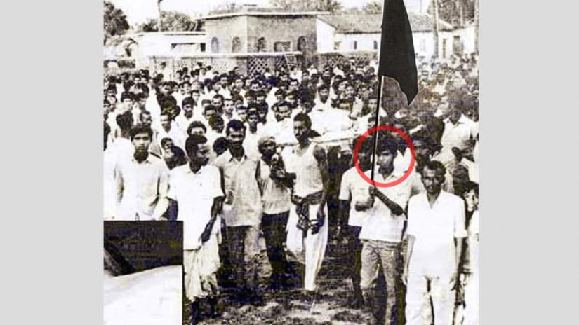 This March 1971 photo shows freedom fighter Munshi Mahiuddin Ahmed, marked red, during a procession in Jashore. COURTESY