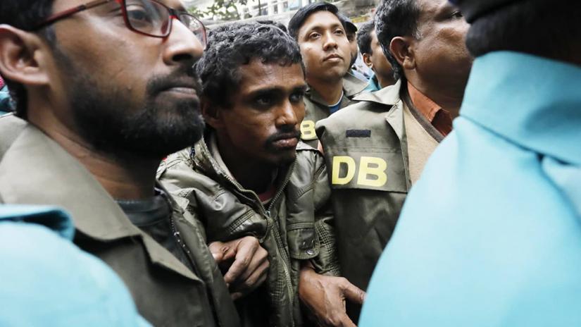 Police escorting Dhaka University student rape suspect Majnu to the court on Thursday (Jan 9). Photo/Sazzad Hossain