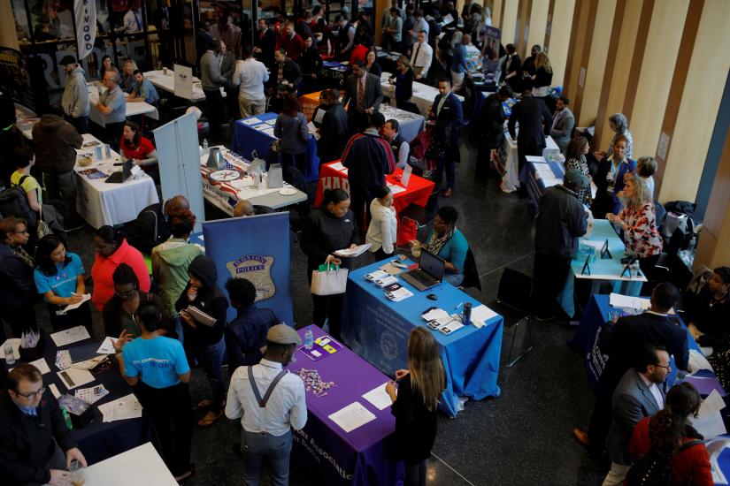 Job seekers speak with potential employers at a City of Boston Neighborhood Career Fair on May Day in Boston, Massachusetts, U.S., May 1, 2017. REUTERS/File Photo
