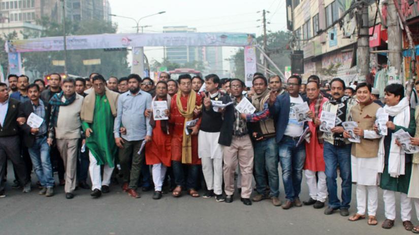Ruling Awami League leaders and activists campaigning on behalf of Dhaka South candidate Sheikh Fazle Noor Taposh.