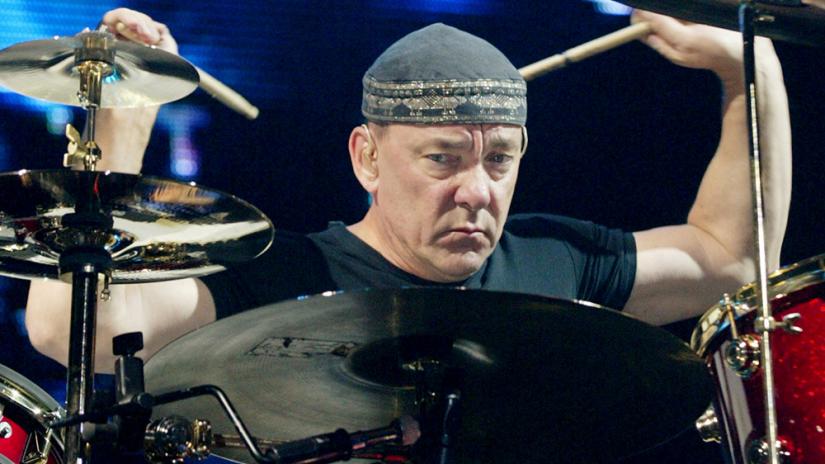 FILE PHOTO - Rush drummer Neil Peart performs during a sold-out show at the MGM Grand Garden Arena in Las Vegas, Nevada September 21, 2002. REUTERS