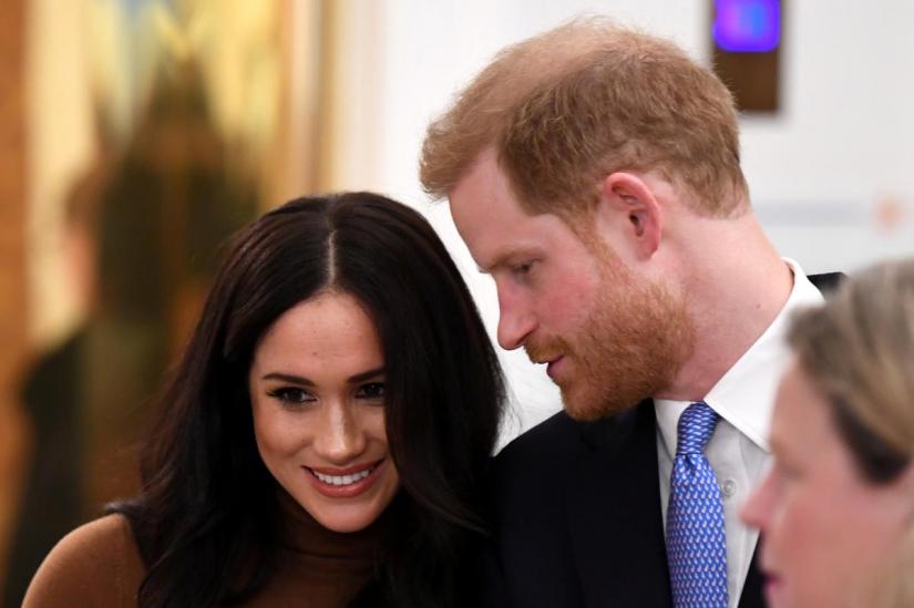 FILE PHOTO: Britain`s Prince Harry and his wife Meghan, Duchess of Sussex visit Canada House in London, Britain Jan 7, 2020. Daniel Leal-Olivas/Pool via REUTERS