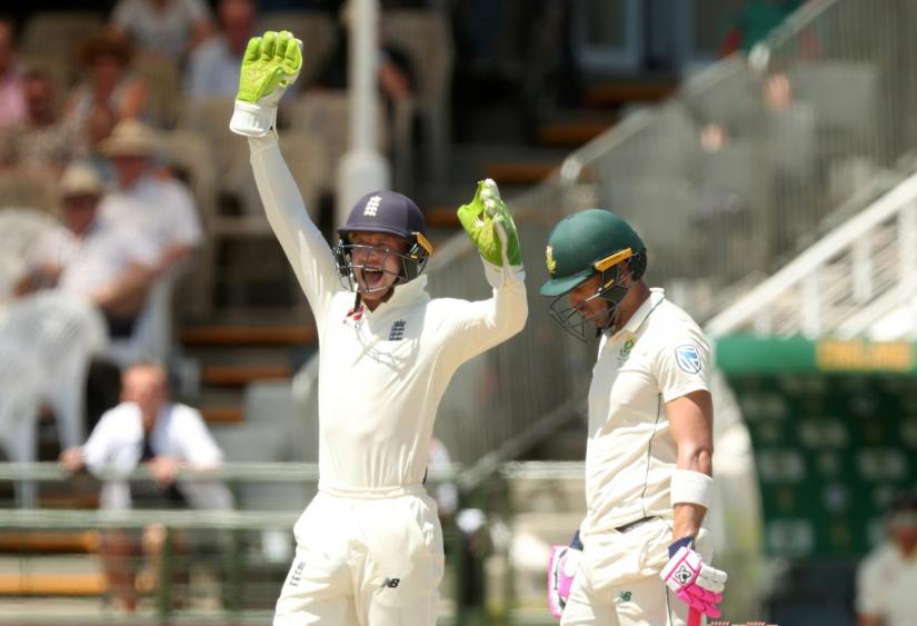 Cricket - South Africa v England - Second Test - PPC Newlands, Cape Town, South Africa - Jan 7, 2020 England`s Jos Buttler appeals unsucessfully for the wicket of South Africa`s Faf du Plessis REUTERS