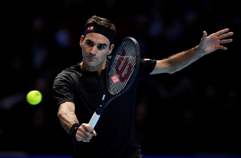 Tennis - ATP Finals - The O2, London, Britain - November 14, 2019 Switzerland`s Roger Federer in action during his group stage match against Serbia`s Novak Djokovic Action Images via Reuters/File Photo