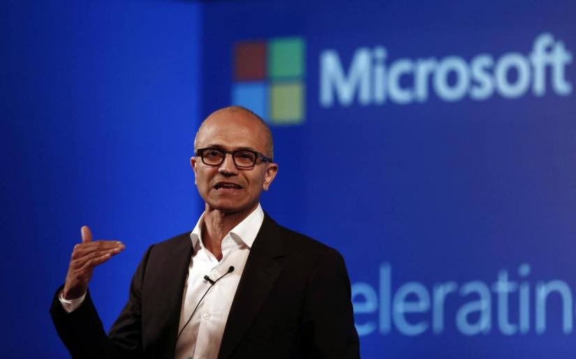 FILE PHOTO: Microsoft Chief Executive Officer (CEO) Satya Nadella addresses the media during an event in New Delhi Sept 30, 2014. REUTERS
