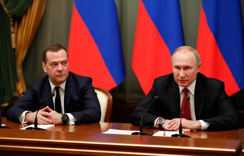 Russian President Vladimir Putin and Prime Minister Dmitry Medvedev attend a meeting with members of the government in Moscow, Russia January 15, 2020. Sputnik/Dmitry Astakhov/Pool via REUTERS