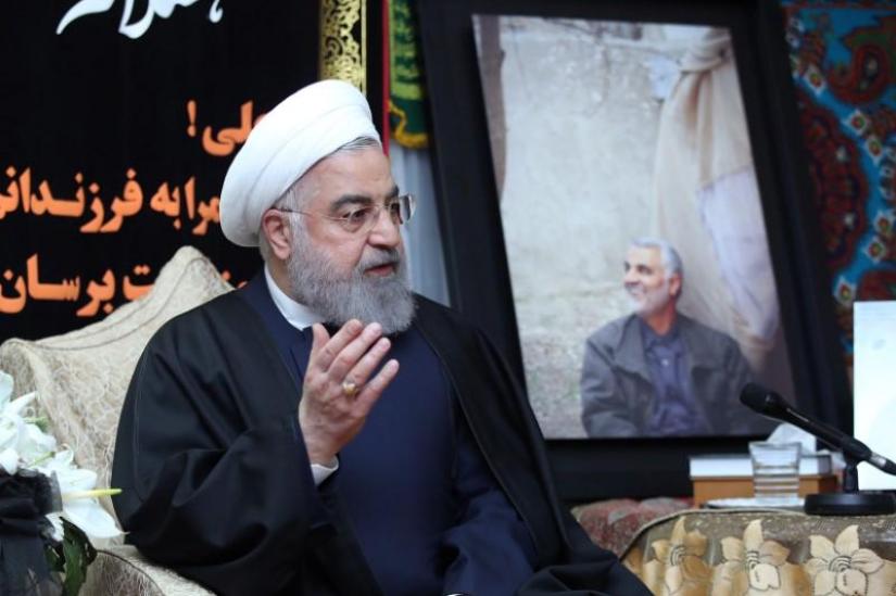 FILE PHOTO: Iranian President Hassan Rouhani visits the family of the Iranian Major-General Qassem Soleimani, head of the elite Quds Force, who was killed by an air strike in Baghdad, at his home in Tehran, Iran Jan 4, 2020. Official President Website/Handout via REUTERS
