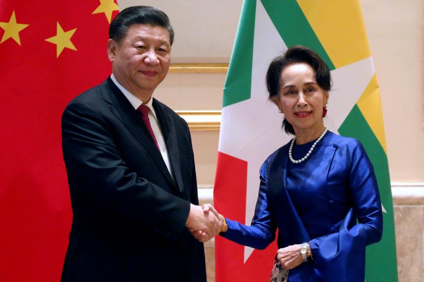 Chinese President Xi Jinping and Myanmar`s State Counsellor Aung San Suu Kyi shake hands at the Presidential Palace in Naypyitaw, Myanmar January 17, 2020. REUTERS
