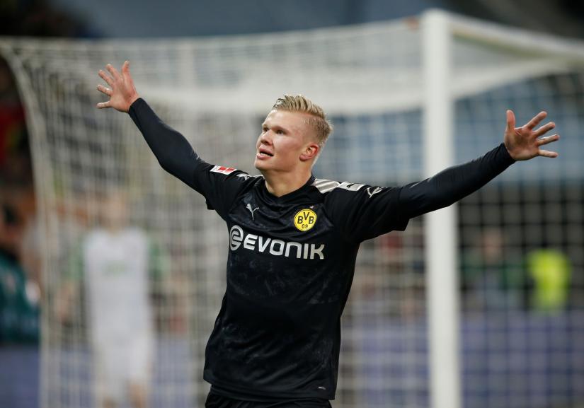 FC Augsburg v Borussia Dortmund - WWK Arena, Augsburg, Germany - January 18, 2020 Borussia Dortmund`s Erling Braut Haaland celebrates scoring their fifth goal to complete his hat-trick REUTERS
