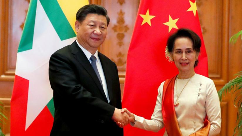 Myanmar State Counselor Aung San Suu Kyi shakes hands with Chinese President Xi Jinping at the Presidential Palace in Naypyitaw, Myanmar, Jan 18, 2020. REUTERS