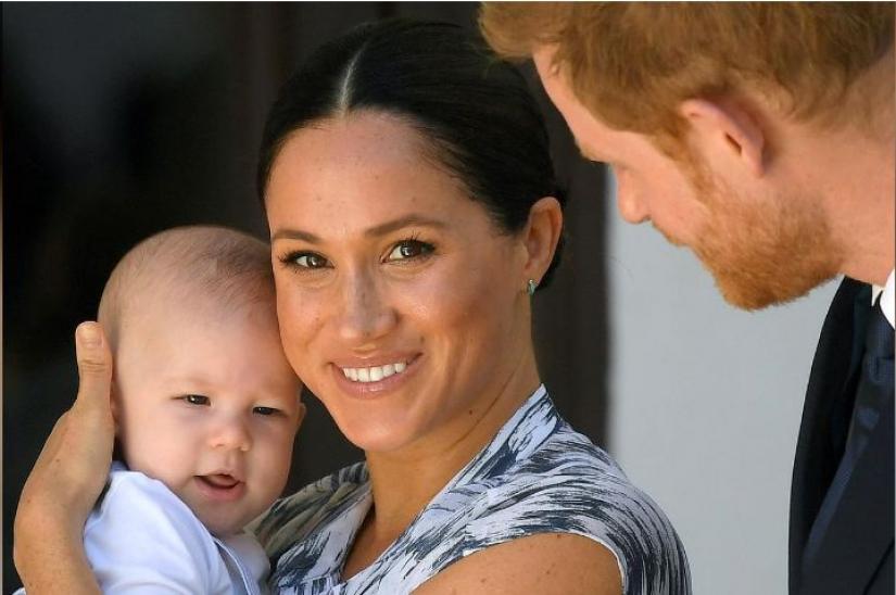 Britain`s Prince Harry and his wife Meghan, Duchess of Sussex, holding their son Archie, meet Archbishop Desmond Tutu (not pictured) at the Desmond & Leah Tutu Legacy Foundation in Cape Town, South Africa, September 25, 2019. REUTERS