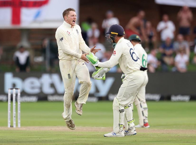 Cricket - South Africa v England - Third Test - St George`s Park, Port Elizabeth, South Africa - January 17, 2020 England`s Dom Bess celebrates taking the wicket of South Africa`s Zubayr Hamza REUTERS