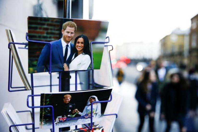 Merchandise depicting Britain`s Prince Harry and Meghan, Duchess of Sussex, are seen on display in a souvenir shop near Buckingham Palace in London, Britain, Jan 19, 2020. REUTERS