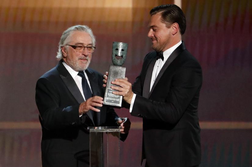 26th Screen Actors Guild Awards - Show - Los Angeles, California, U.S., January 19, 2020 - Robert De Niro accepts the Life Achievement Award from presenter Leonardo DiCaprio. REUTERS