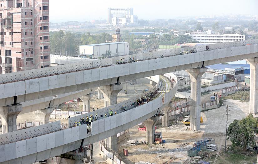 Workers busy with the construction works of the Mass Rapid Transit (MRT) project in Dhaka PHOTO/Syed Zakir Hossain