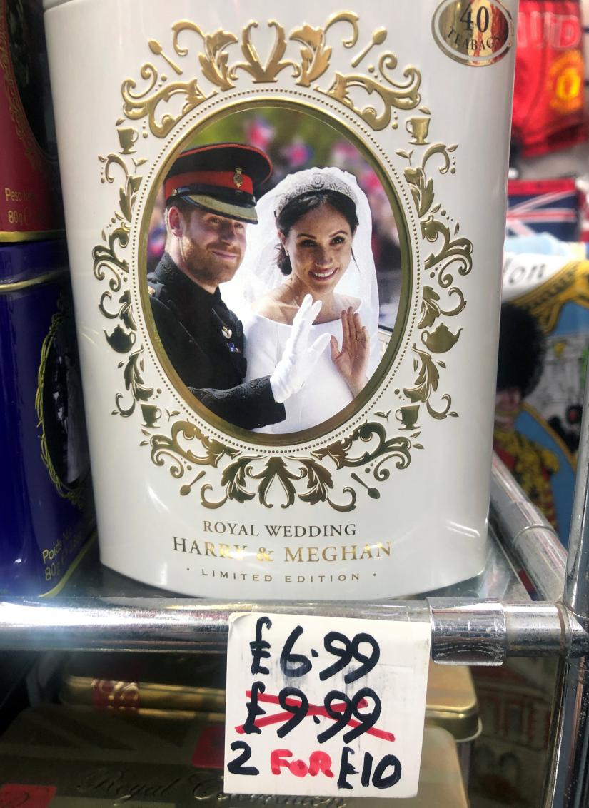 Discounted merchandise depicting Britain`s Prince Harry and Meghan, Duchess of Sussex, is displayed in Windsor, Britain January 20, 2020. REUTERS