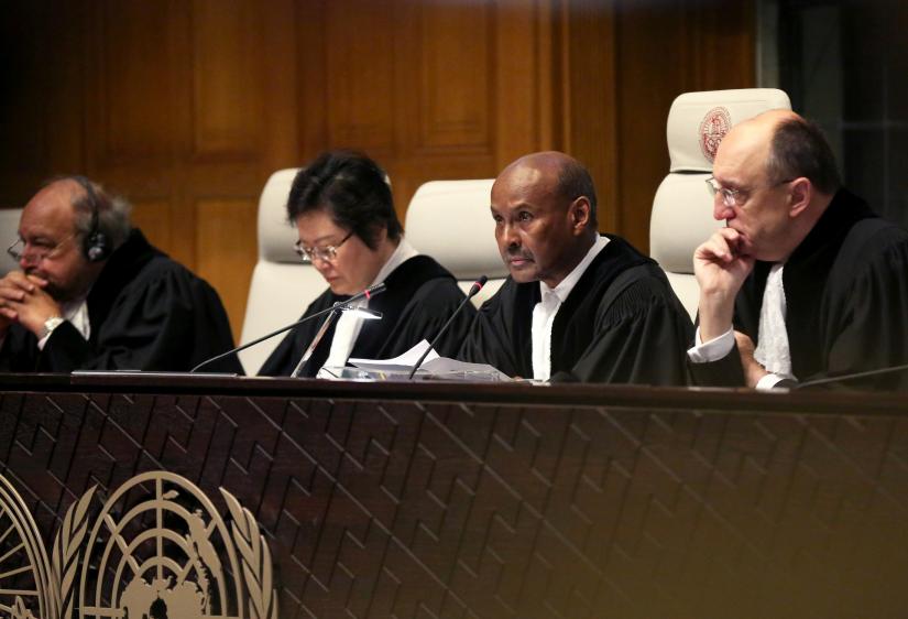 Judge Abdulqawi Ahmed Yusuf is pictured during the ruling in a case filed by Gambia against Myanmar alleging genocide against the minority Muslim Rohingya population, at the International Court of Justice (ICJ) in The Hague, Netherlands January 23, 2020. REUTERS