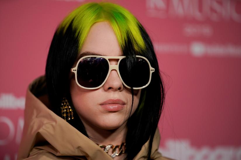 American singer-songwriter Billie Eilish arrives on the red carpet for the `Billboard Women in Music` event in Los Angeles, California, U.S. December 12, 2019. REUTERS/File Photo