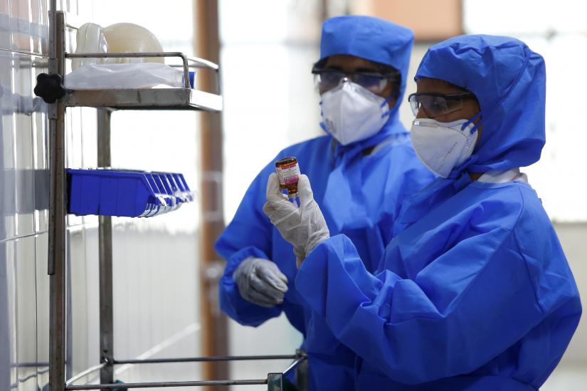 Medical staff with protective clothing are seen inside a ward specialised in receiving any person who may have been infected with coronavirus, at the Rajiv Ghandhi Government General hospital in Chennai, India, January 29, 2020. REUTERS