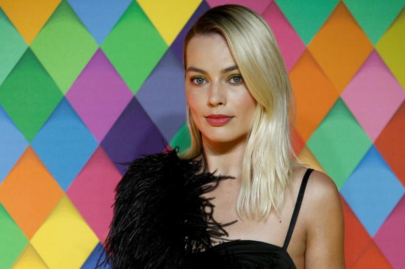 Cast member Margot Robbie poses as she arrives to attend the world premiere of `Birds of Prey: And the Fantabulous Emancipation of One Harley Quinn`, in London, Britain Jan 29, 2020. REUTERS