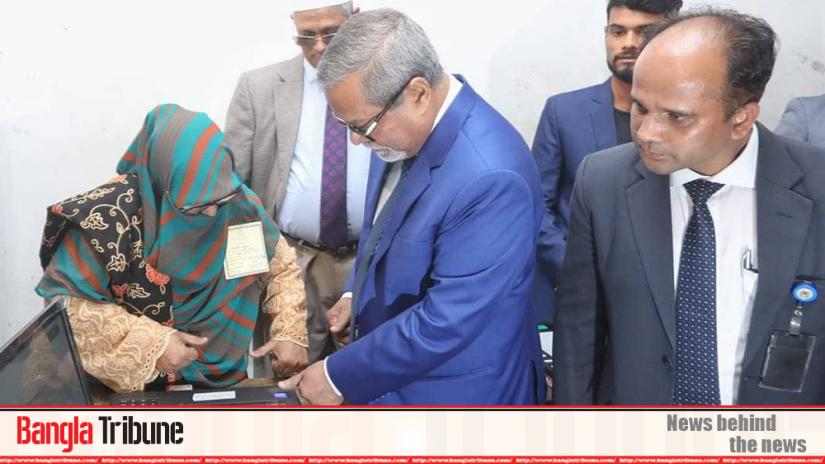 Chief Election Commissioner KM Nurul Huda had to cast his vote with his national identification (NID) number after his fingerprint didn't match in the EVM.