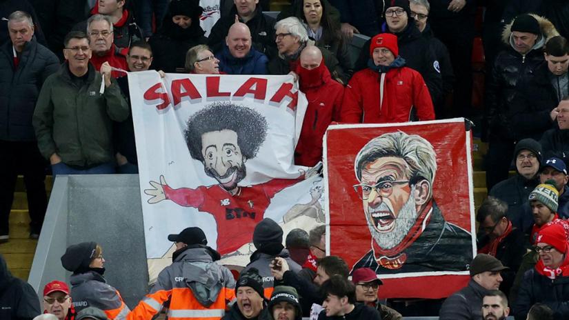 Soccer Football - Premier League - Liverpool v Southampton - Anfield, Liverpool, Britain - Feb 1, 2020 Liverpool fans displays banners of Mohamed Salah and manager Juergen Klopp Action Images via Reuters