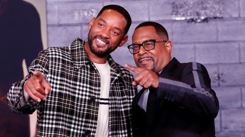 FILE PHOTO: Cast members Will Smith (L) and Martin Lawrence pose at the premiere of `Bad Boys for Life` in Los Angeles, California, US, Jan 14, 2020. REUTERS
