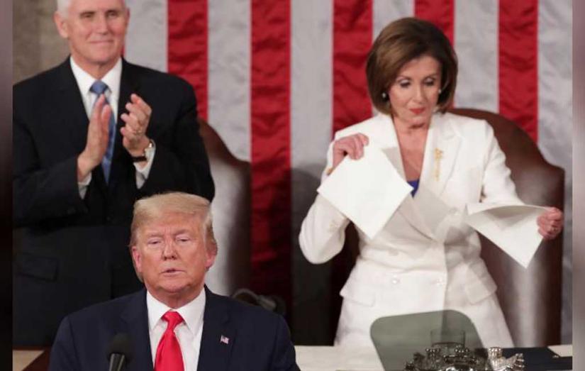 Speaker of the House Nancy Pelosi (D-CA) rips up the speech of US President Donald Trump after his State of the Union address to a joint session of the U.S. Congress in the House Chamber of the US Capitol in Washington, US February 4, 2020 Reuters
