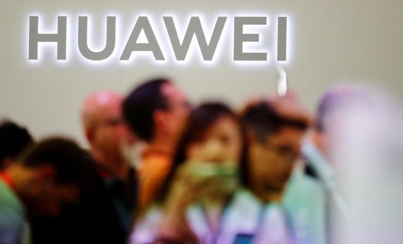 FILE PHOTO: The Huawei logo is pictured at the IFA consumer tech fair in Berlin, Germany, Sept 6, 2019. REUTERS