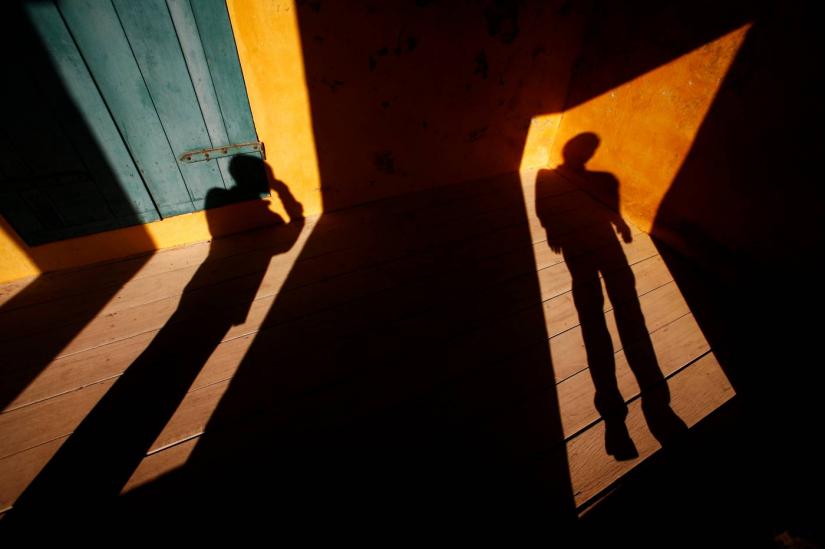 People`s shadows are cast in doorways at the `House of Slaves` on Goree Island near Senegal`s capital Dakar, March 16, 2007.REUTERS/File Photo