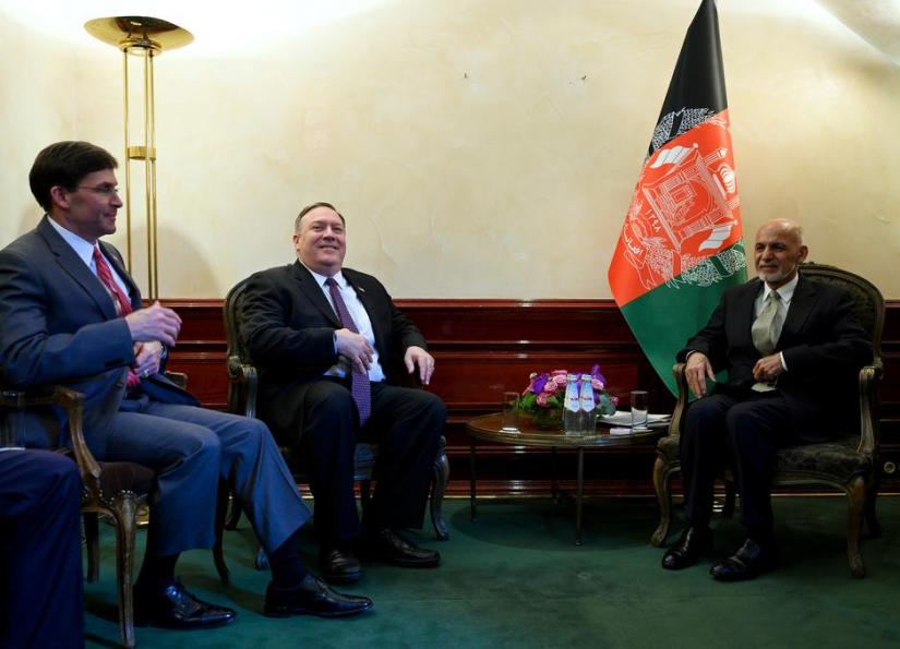 US Secretary of State Mike Pompeo (2nd L), together with US Secretary of Defense Mark Esper (L), meets with Afghan President Ashraf Ghani during the Munich Security conference in Munich, southern Germany Feb 14, 2020. Andrew Caballero-Reynolds/Pool via REUTERS