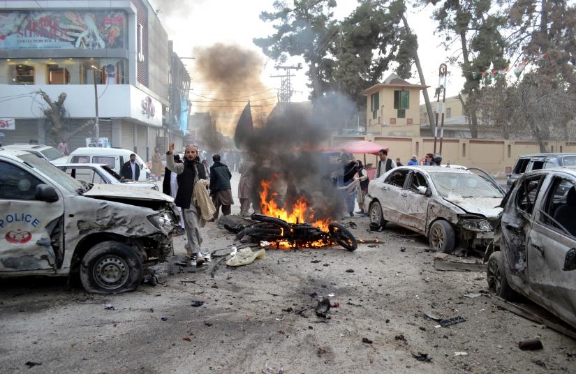 People gather at the site of a bomb blast in Quetta, Pakistan February 17, 2020. REUTERS