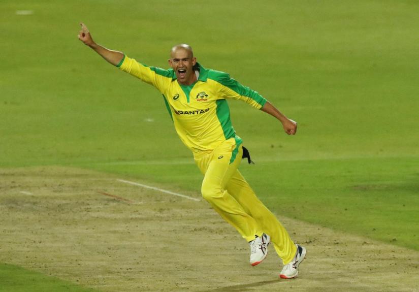 Cricket - South Africa v Australia - First T20 - Imperial Wanderers Stadium, Johannesburg, South Africa - Feb 21, 2020 Australia`s Ashton Agar celebrates taking the wicket of South Africa`s Dale Steyn Action Images via Reuters